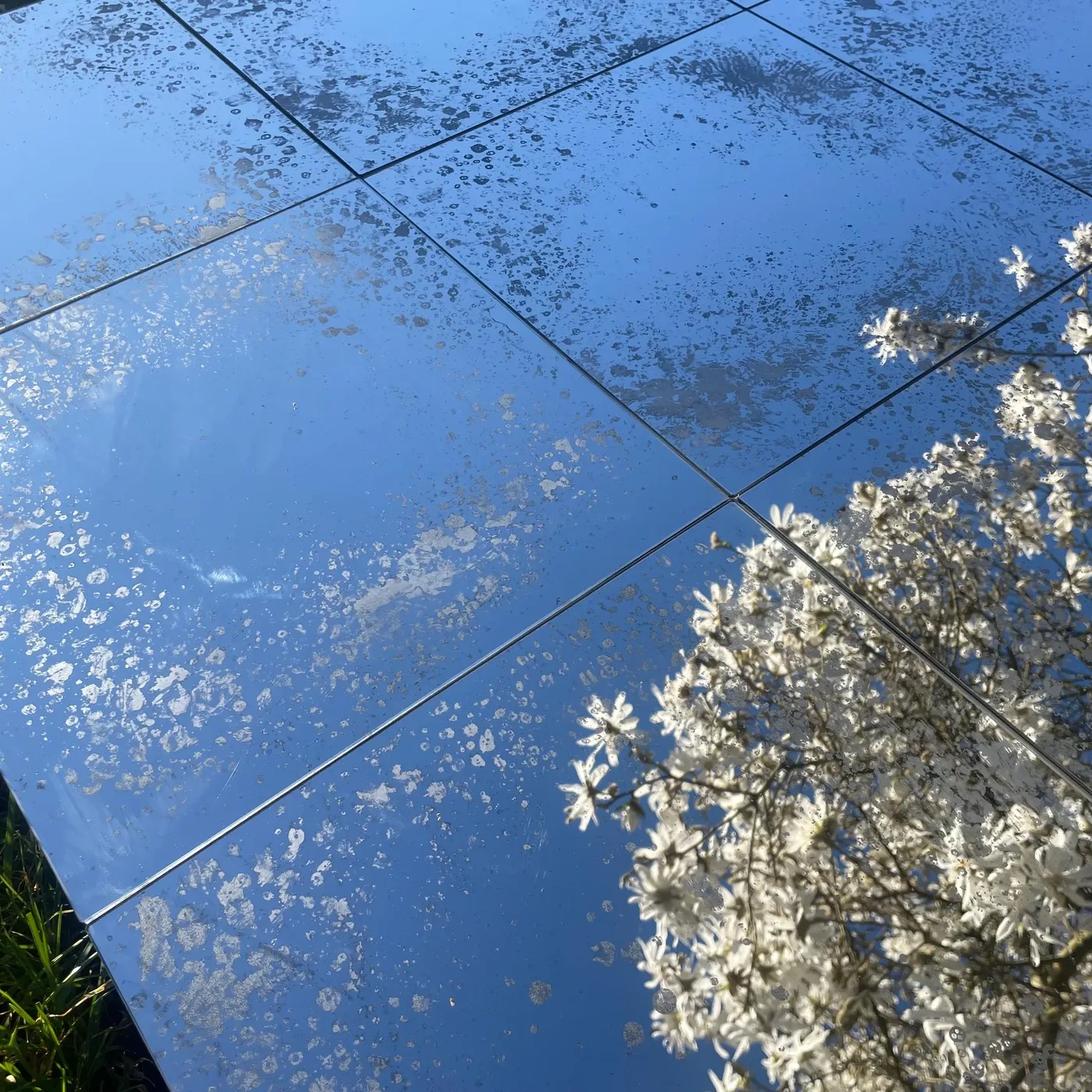 Silver foxed and distressed mirror tile, 30x30cm, handcrafted by Foxy Glass